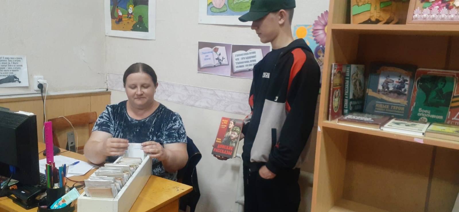 _4_27.05.2025_День_специалиста_Библиотекарь_на_час_в_Савоськинском_отделе.jpeg