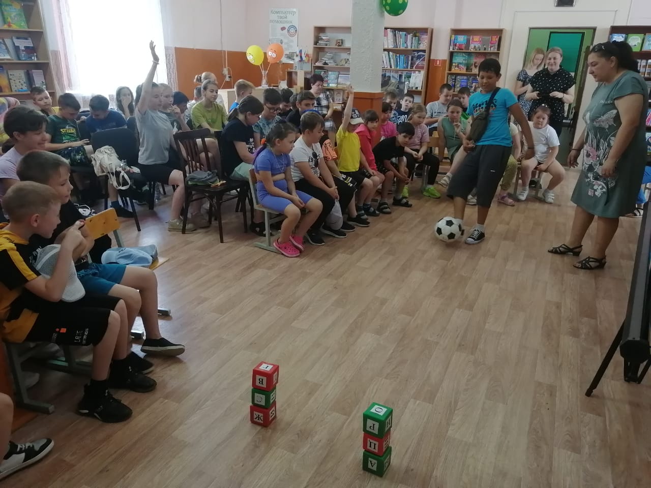 Фото 3. 15.06.2023 Познавательная игра Все о футболе на БИБЛИОполе. ЦБ